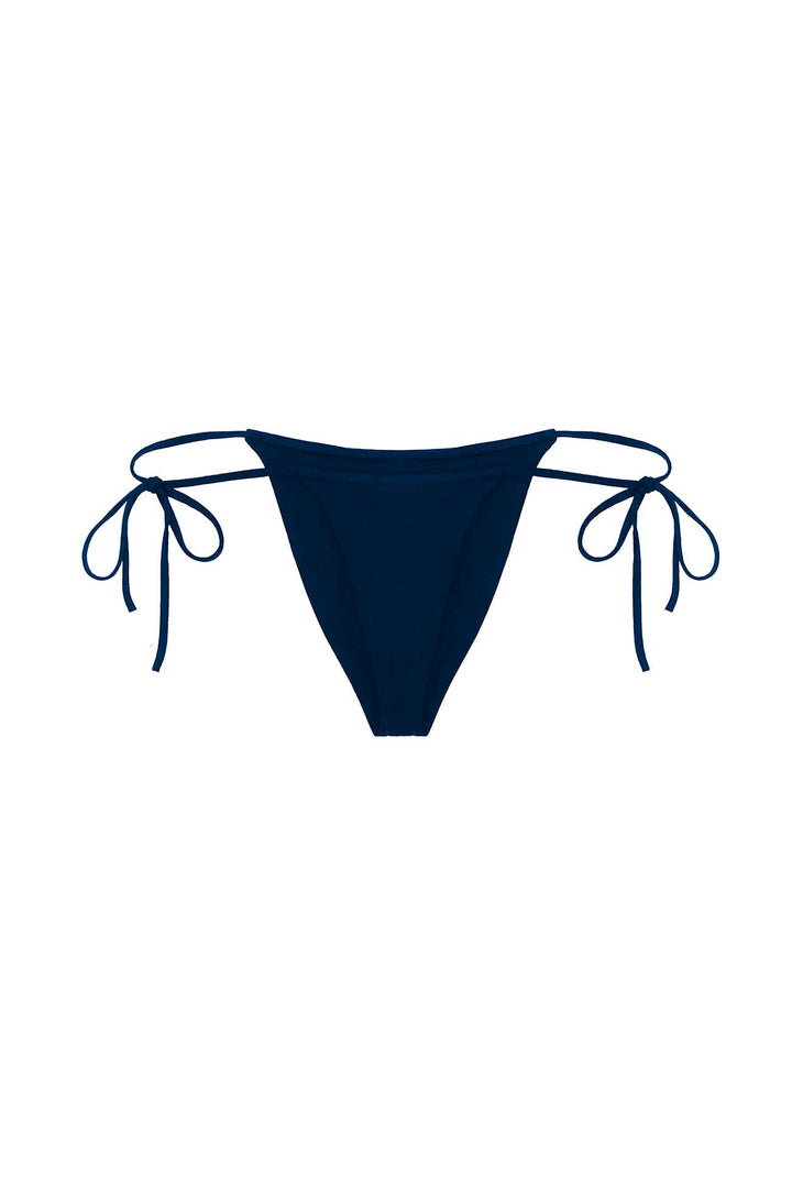 A pair of navy blue 100% merino wool string bikini bottoms displayed flat against a solid white background.