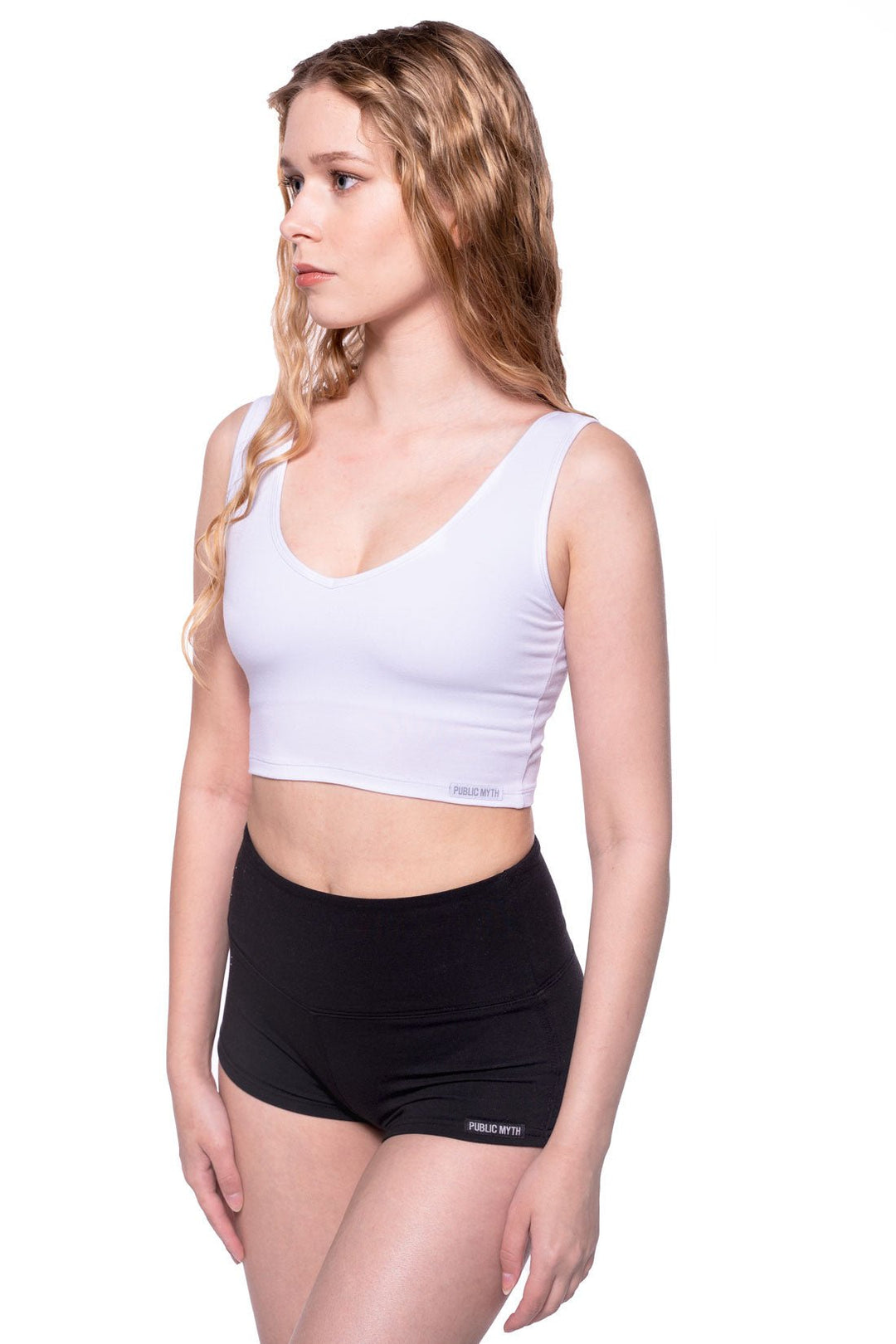 White V neck sports bra and black booty short outfit