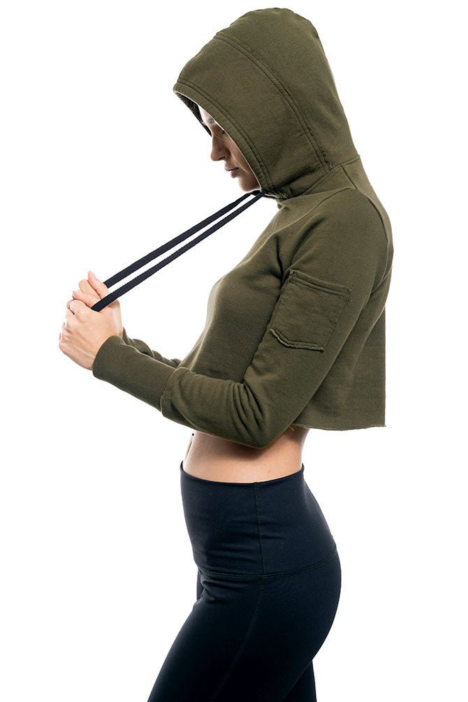 Green women's crop hoodie with a pocket on the left sleeve