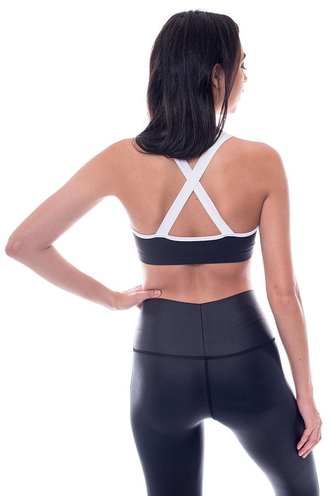 Black and white sports bra with cross back